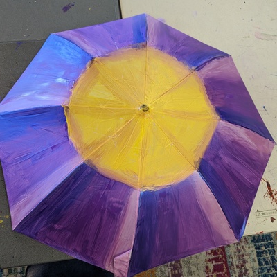 Umbrella prop painted by Wednesday group at Franklin Park Arts Center
