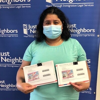 Rosibel celebrates getting green cards for her family.