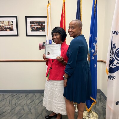 Monime celebrates her new U.S. citizenship with her daughter after living in the U.S. for 40 years.