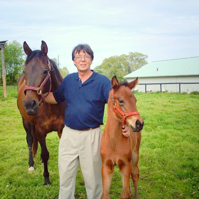 Our Co-Founder Tim Parmly with a mare and her foal