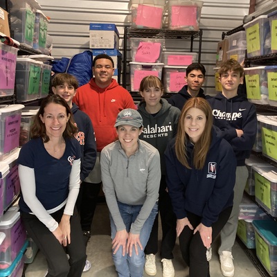 Volunteer crew helping organize the Emergency Closet March 2023.