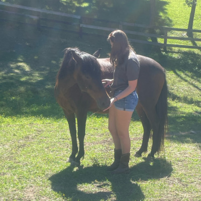 Minnie with volunteer Sophia.