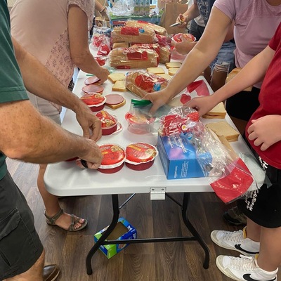 Making bagged lunches to deliver door to door with our amazing volunteers!