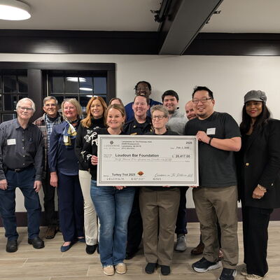 "Beat the Odds" Committee Accepts Fundraising Check from the Lansdowne on the Potomac HOA