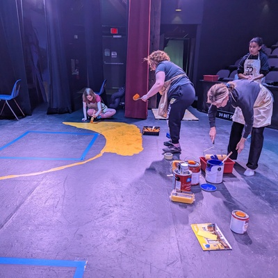 Nicole, Rachel, Riley and their moms volunteer to help paint the stage for the AFA Oz production (Franklin Park Arts Center)