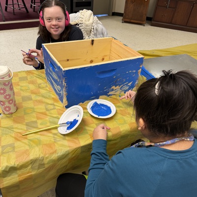 Painting our bee hive that will be housing a queen bee in the spring!
