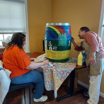 Alicia and Regina Painting the Wine Barrel
