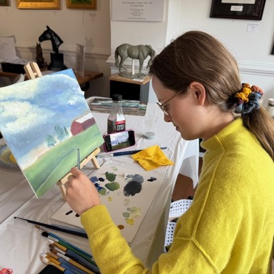 Young student in painting class