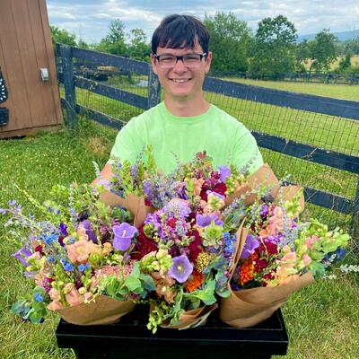 Ethan with the Bouquets he prepared!
