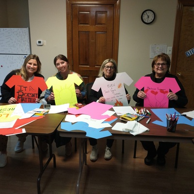 Members of DAAR helping us with our Clothesline Project.