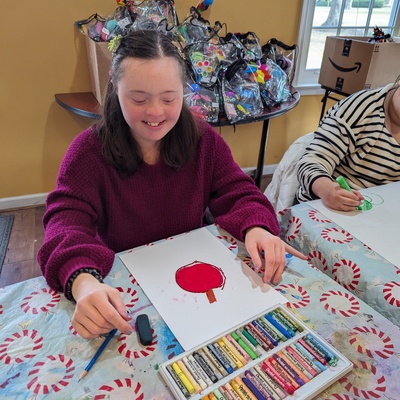 Catherine S works on an apple picture