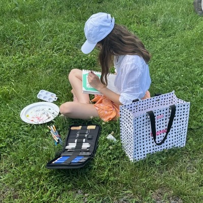 Student in outdoor painting class